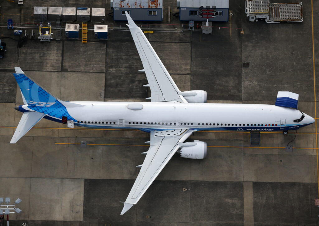 Aerial view of a boeing 737 max aircraft parked at a manufacturing facility