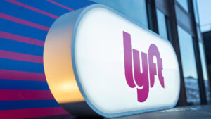 Illuminated lyft logo sign outside the companys headquarters