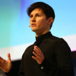 Pavel Durov, founder of Telegram, speaking at a global conference, emphasizing secure communication and digital privacy.