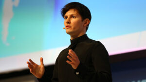 Pavel Durov, founder of Telegram, speaking at a global conference, emphasizing secure communication and digital privacy.