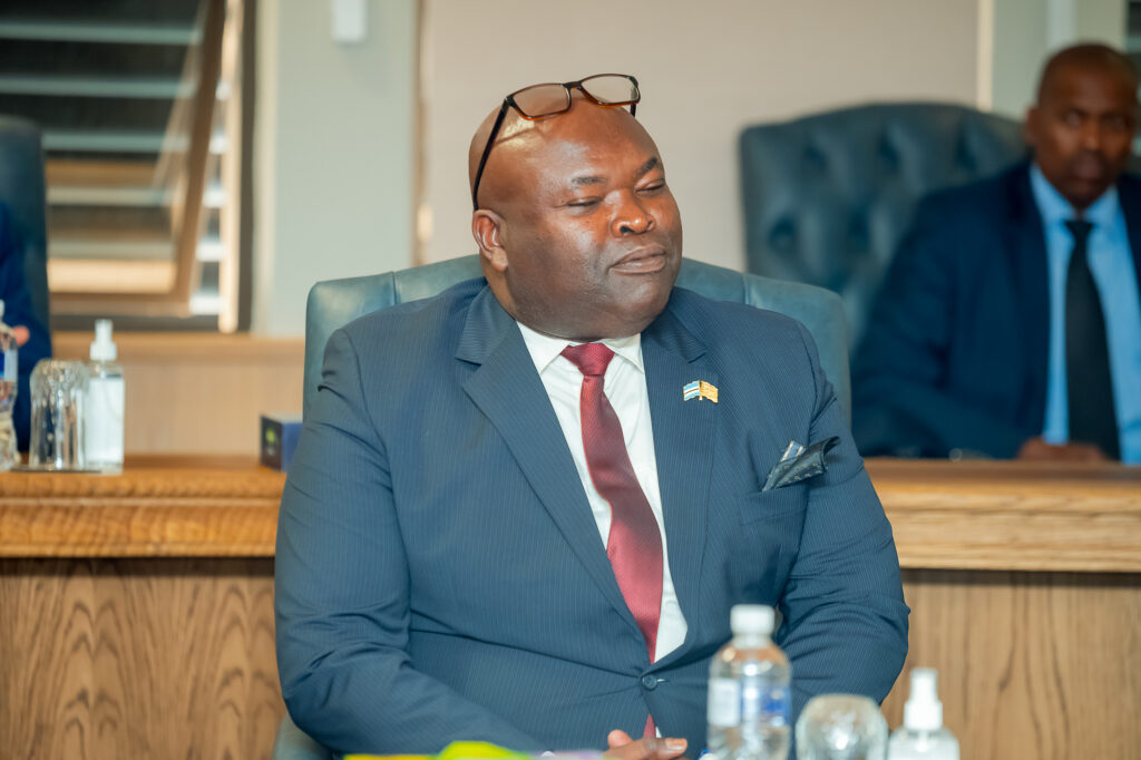 Assistant minister of justice and correctional services augustine ngatanga seated during the swearing in ceremony of new cabinet ministers in botswana