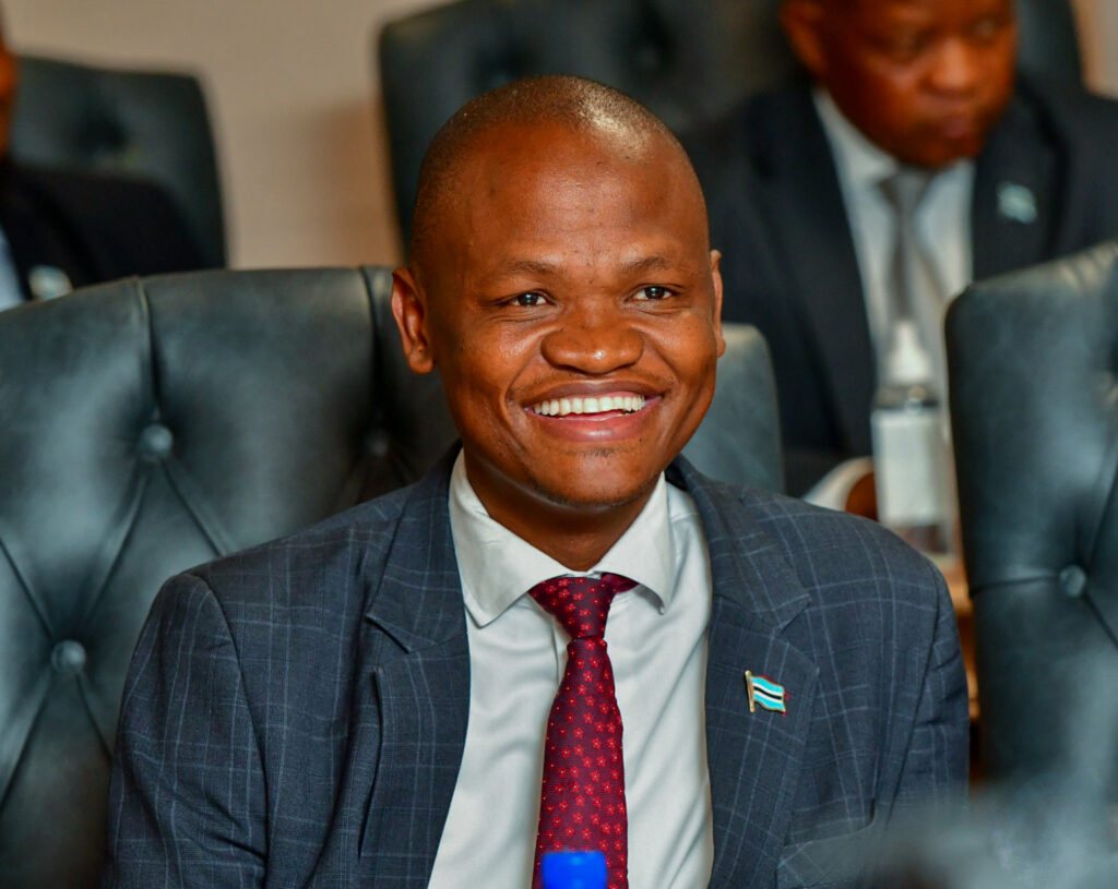 Deputy minister of land and agriculture edwin dikoloti of botswana smiling during the swearing in ceremony of new cabinet ministers