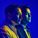 AI-generated image of Elon Musk and Vivek Ramaswamy, featuring a dramatic blue and yellow lighting contrast, both looking forward.