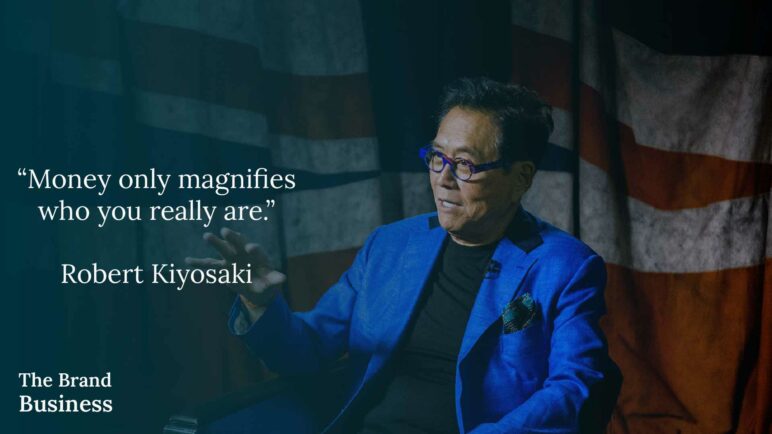 Money quote by robert kiyosaki on a wallpaper bcakground