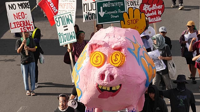 Bangkok Protesters Clash with IMF and World Bank, Raising Concerns Over Global Capitalism. In Bangkok, Thai protesters decried the IMF and World Bank's annual meetings, highlighting fears that their p